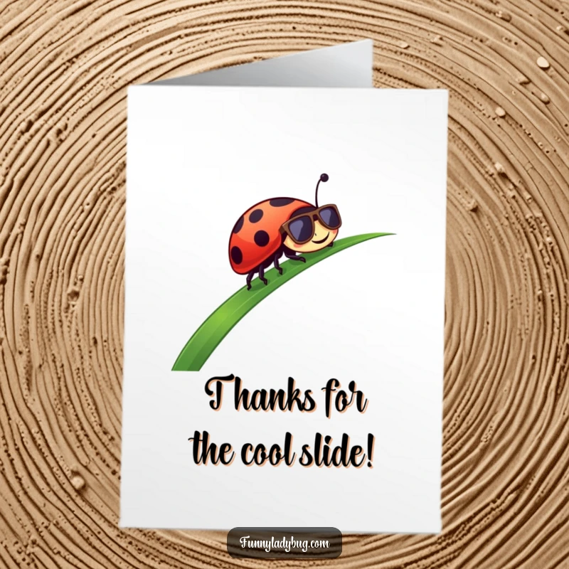 Funny Free Printable Thank You Card: A happy ladybug in sunglasses enjoying a grass slide.